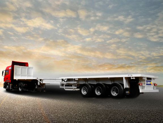 La semi-remorque plateau extensible COMET est destin&eacute;e au transport exceptionnel de charges indivisibles extra longues comme les pipelines et les grumes. Sa ma